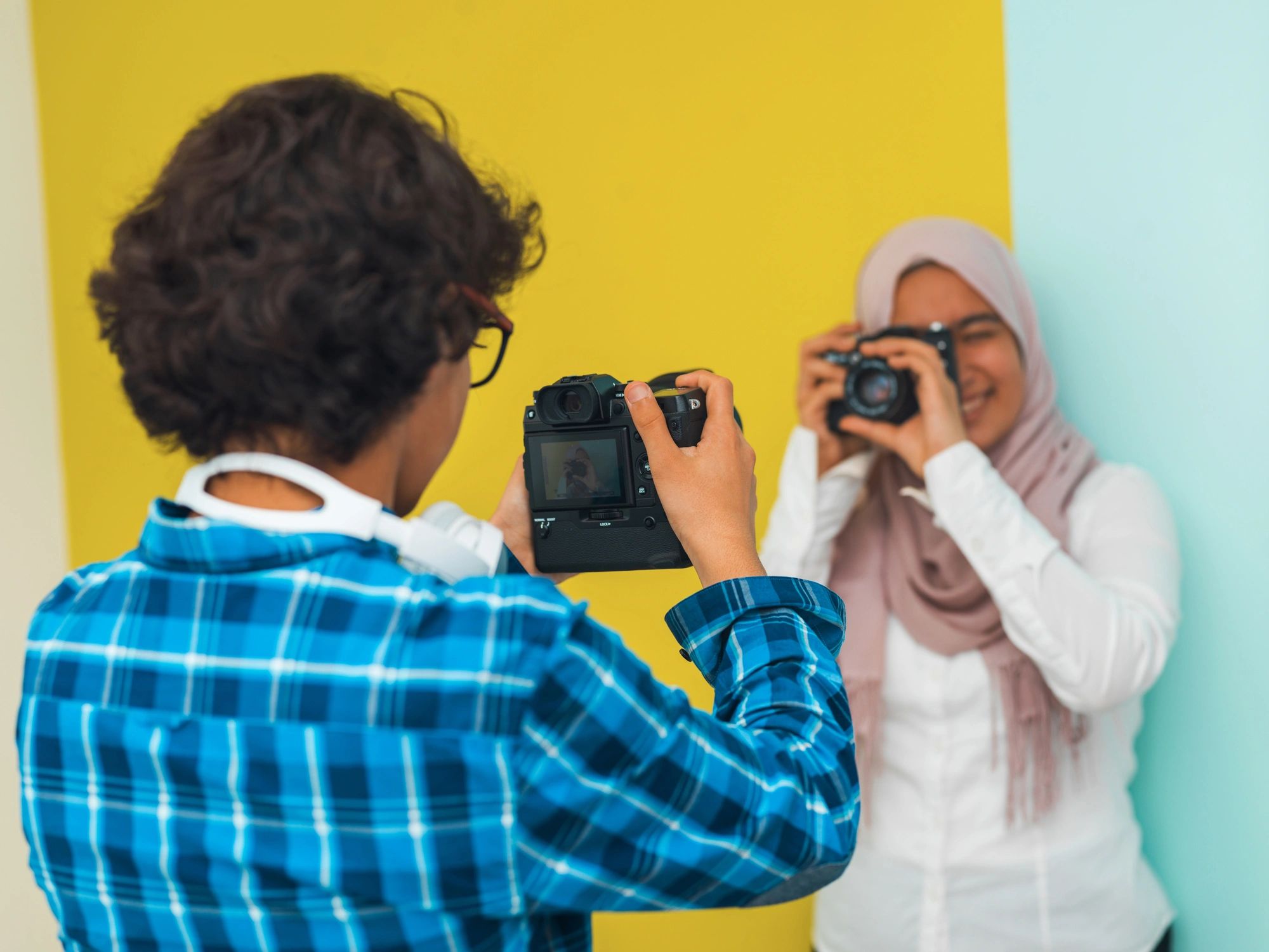 Person filming outdoors with a camera
