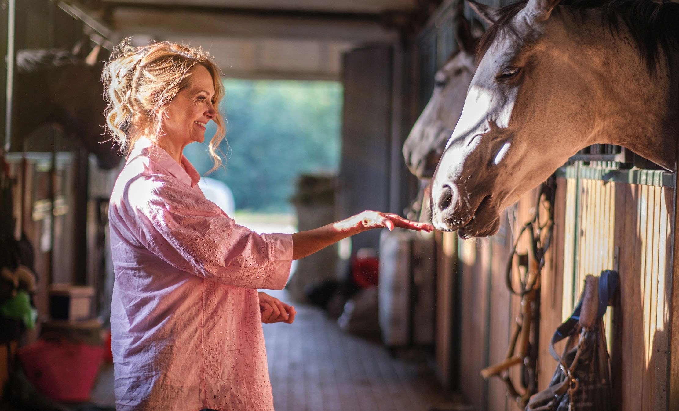 Female rider bonding with her horse